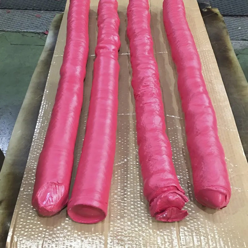 Rodillos con recubrimiento de elastómero fabricados por moldeo
